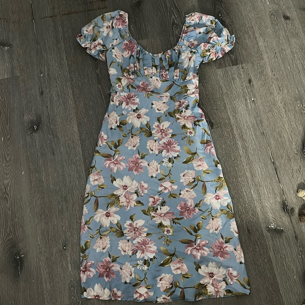 Beautiful blue dress. Worn once for photos. Perfect for spring. Good shape.